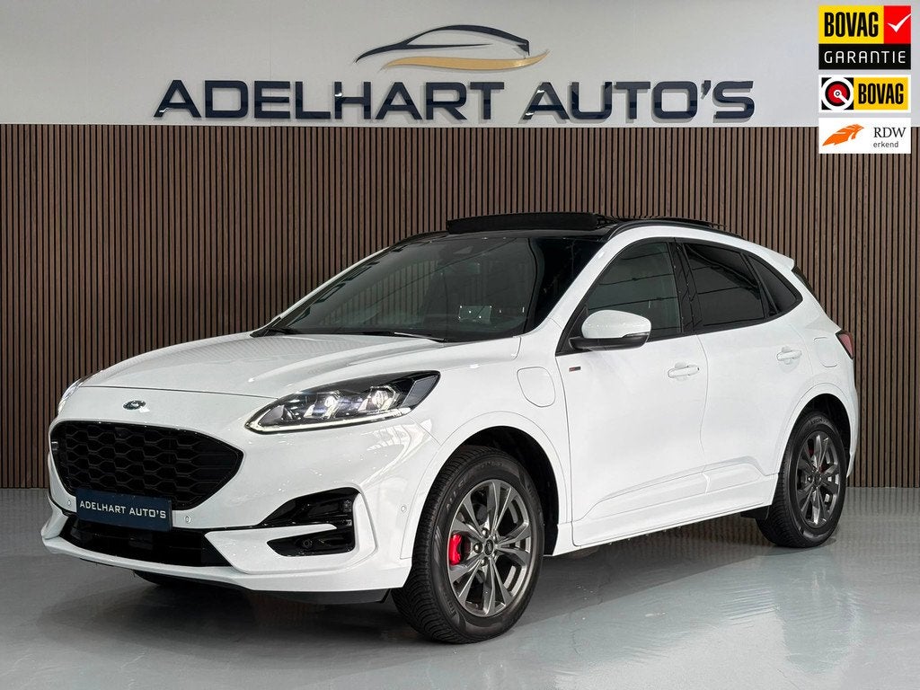 Ford Kuga 2.5 PHEV ST-Line X Automaat / Panorama dak / Adapt, Auto's, Ford, Gebruikt, Zwart, 4 cilinders, Wit