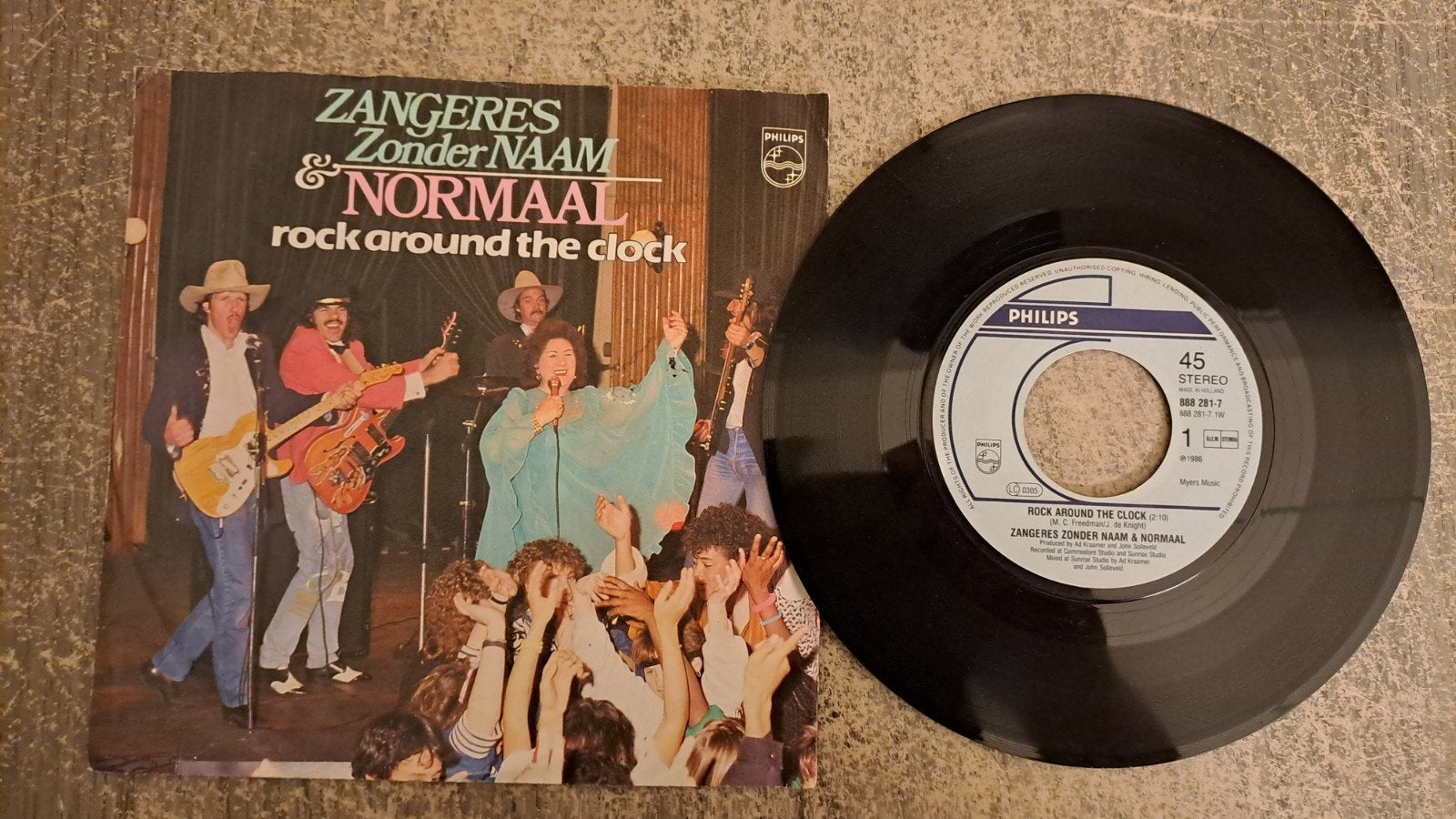 Zangeres zonder naam & normaal  - rock around the clock, Gebruikt, 7 inch, Nederlandstalig, Fotohoes