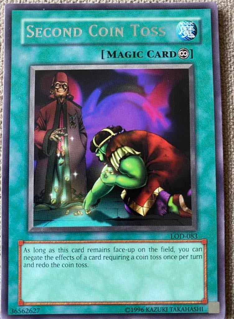 Yu-Gi-Oh! Second Coin Toss LOD Old US Print !, Ophalen of Verzenden, Zo goed als nieuw, Losse kaart