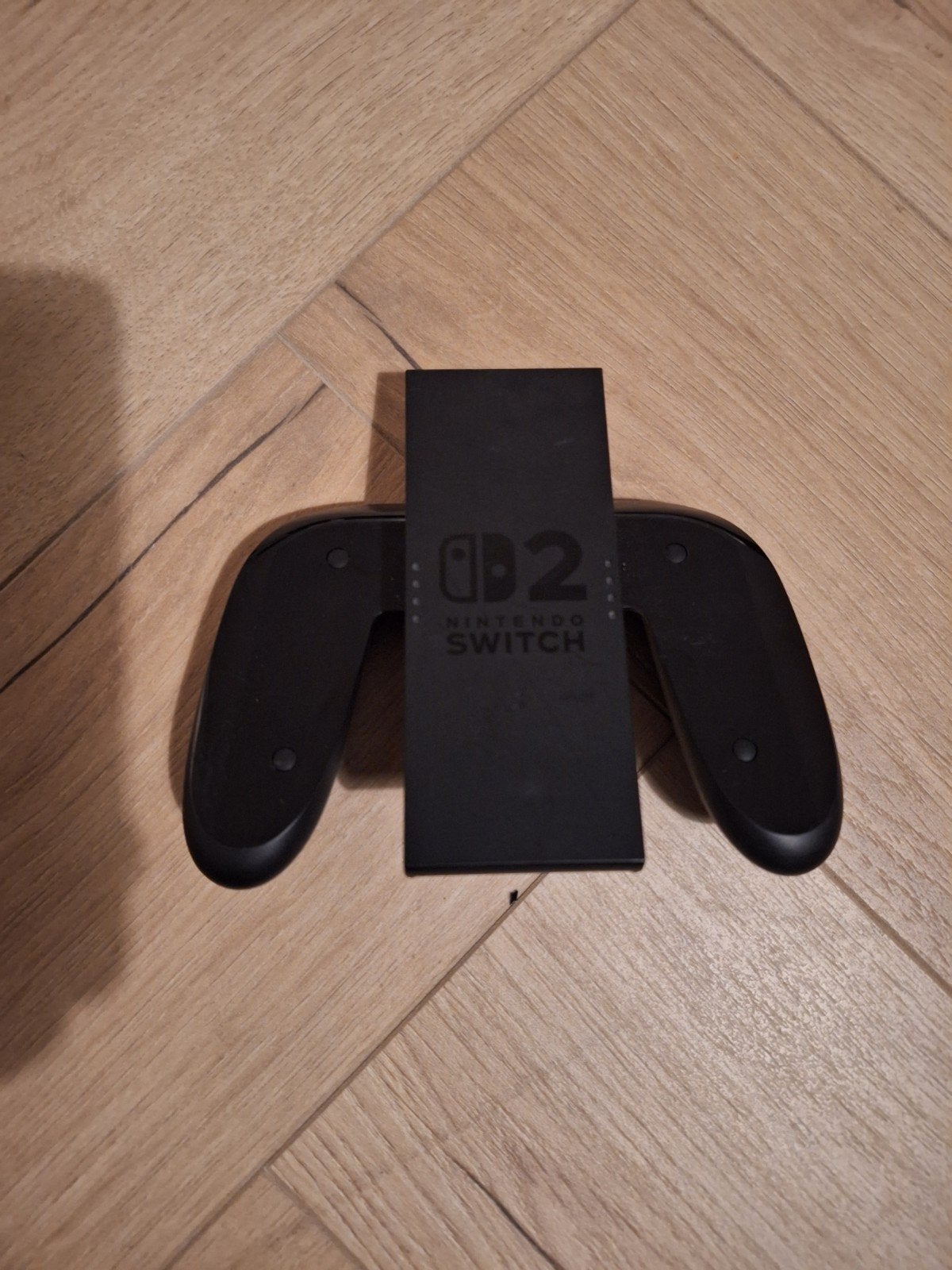 Nintendo Switch 2 Joy-Con Grip NIEUWSTAAT, Ophalen of Verzenden, Zo goed als nieuw, Zonder controller, Switch Original