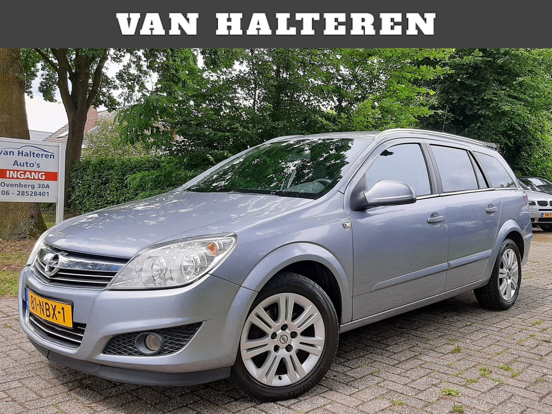 Opel Astra Wagon 1.6 Cosmo Airco Navi Leder Cruise Control, Auto's, Opel, Voorwielaandrijving, 15 km/l, Gebruikt, Zwart