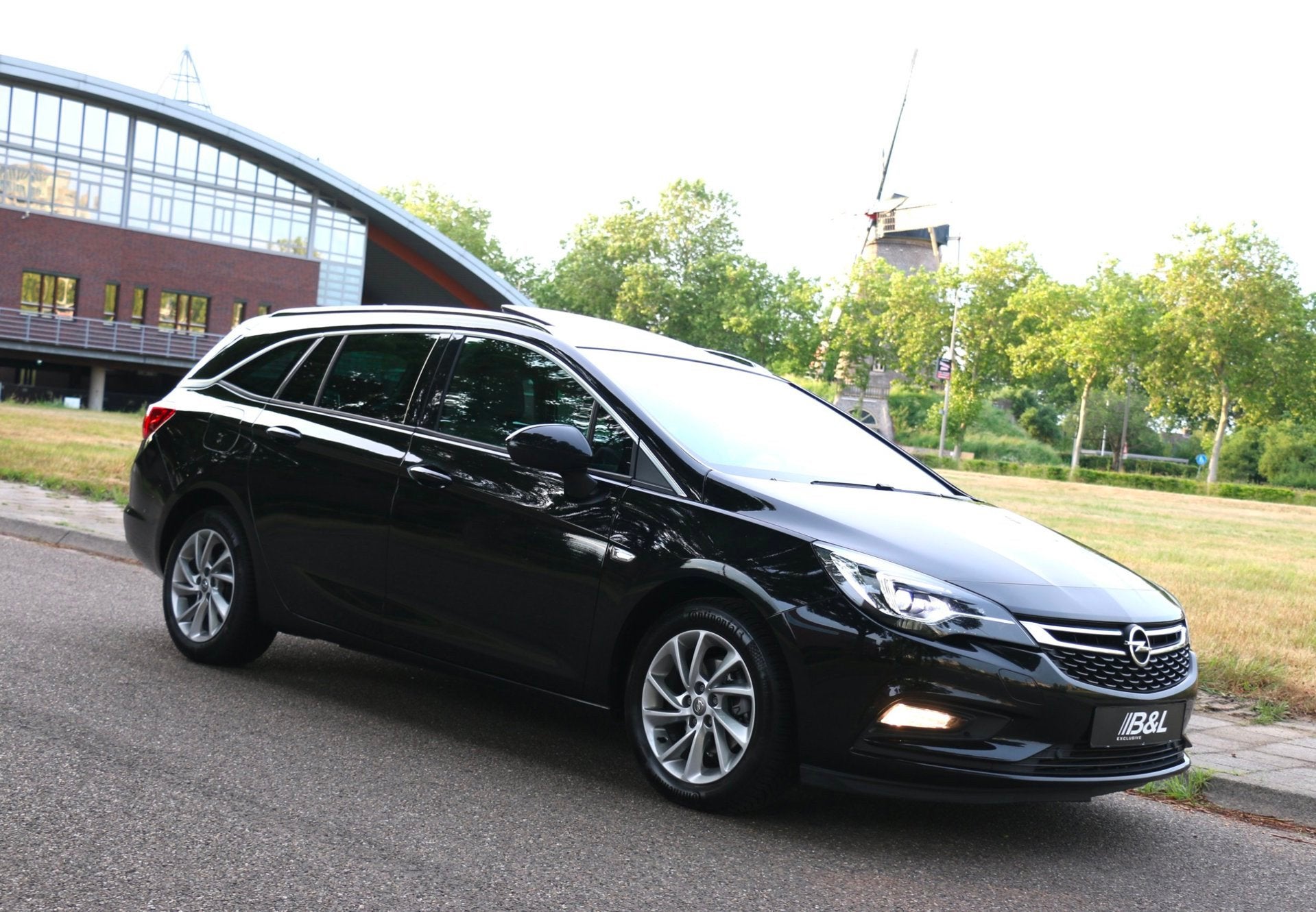 Opel Astra Sports Tourer 1.4 Automaat 150Pk Full Option Aut, Gebruikt, Zwart, Leder, 1240 kg