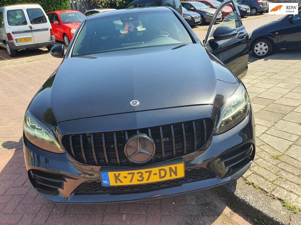 Mercedes-Benz C-klasse 180 Premium Plus Pack,AMG line,Grill, Auto's, Euro 6, Zwart, 1595 cc, Sedan