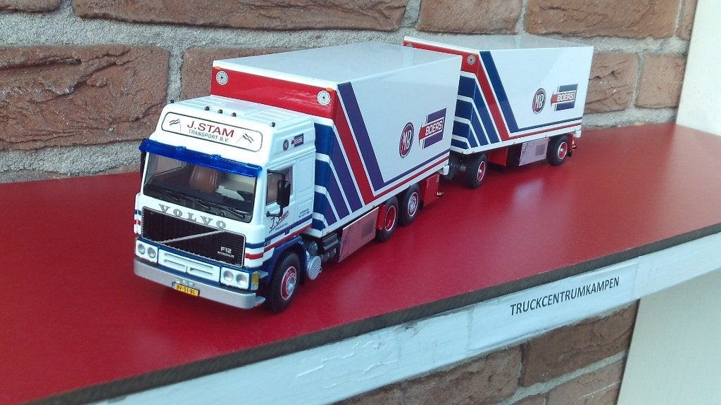 WSI  Volvo  F12  Globetrotter  6 x 2  van  J.  Stam., Ophalen of Verzenden, Nieuw, Bus of Vrachtwagen, Wsi
