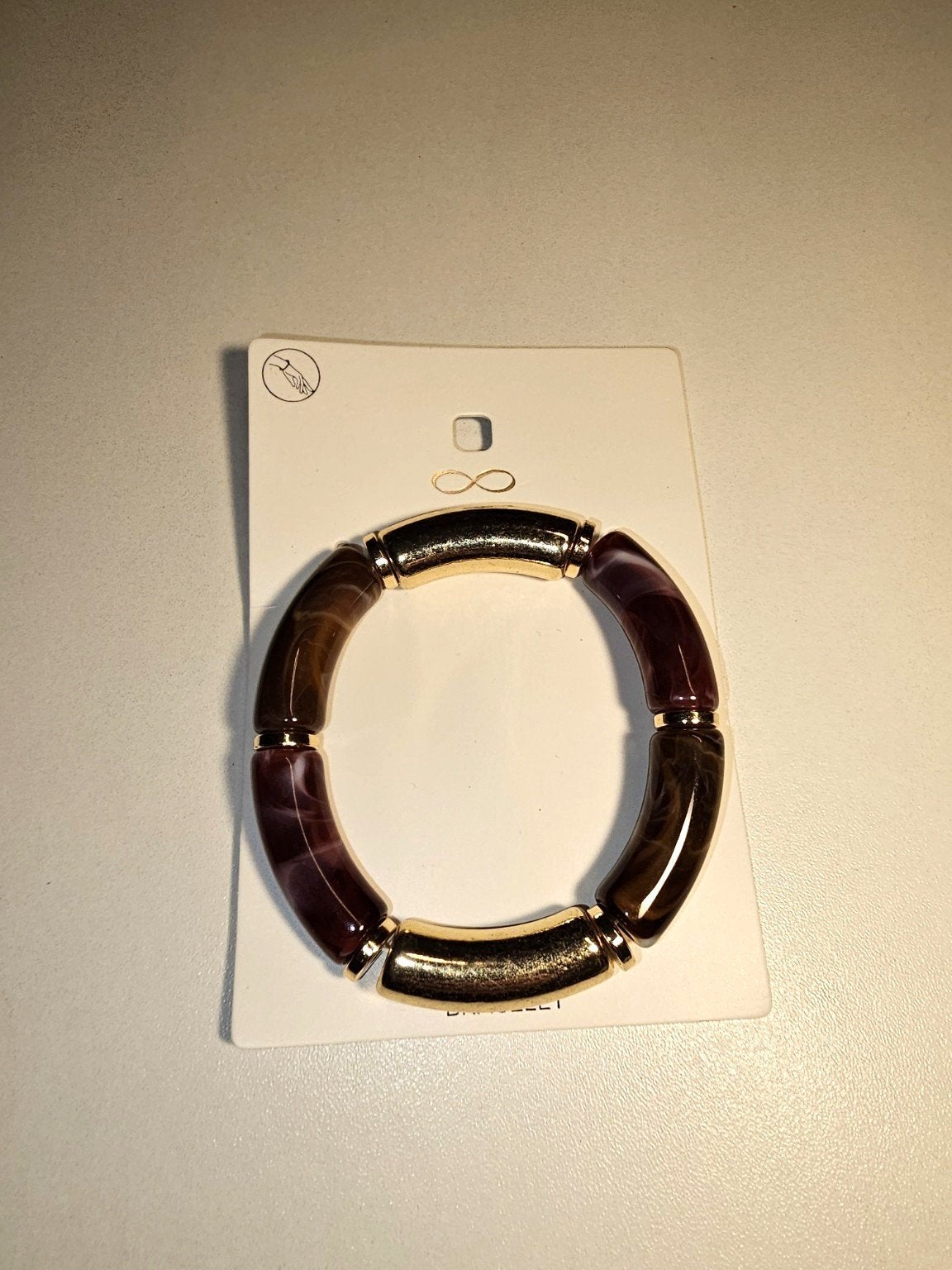 Stijlvolle Armband met Goudkleurige en Paarse Details, Ophalen of Verzenden, Nieuw, Paars, Kunststof of Plastic