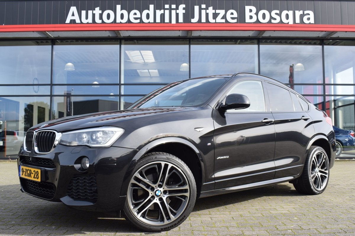 BMW X4 XDrive20i Automaat High Executive M-Sport Bi-Xenon |, Gebruikt, 4 cilinders, Zwart, Bedrijf
