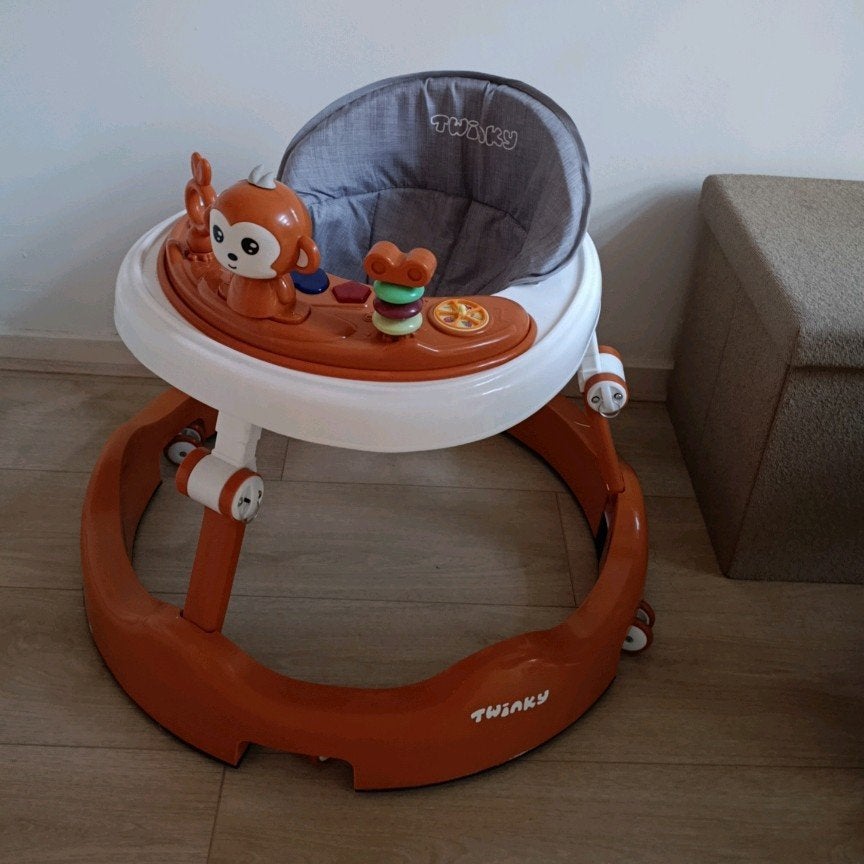 Loopstoel/Baby Walker Twinky bruin, Ophalen of Verzenden, Zo goed als nieuw, Loopvoertuig
