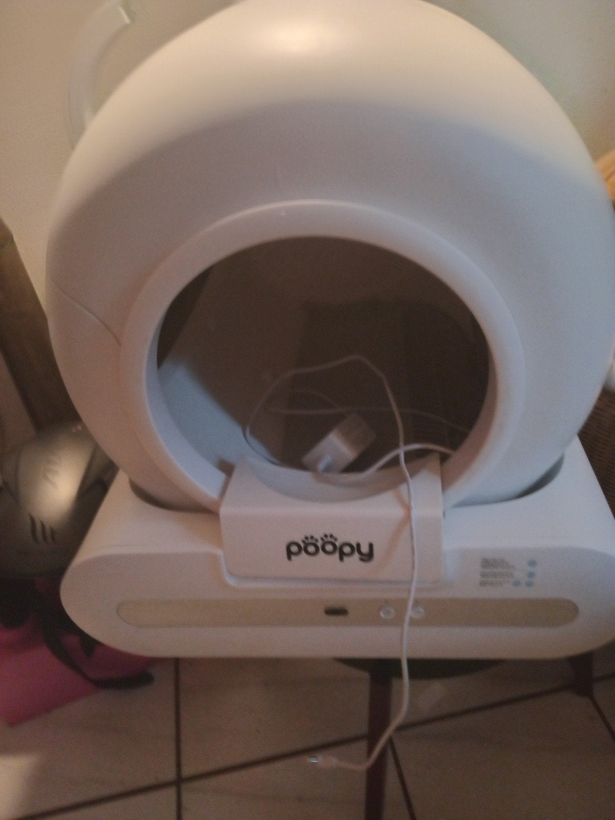 Poopy zelfreinigende kattenbak, Ophalen