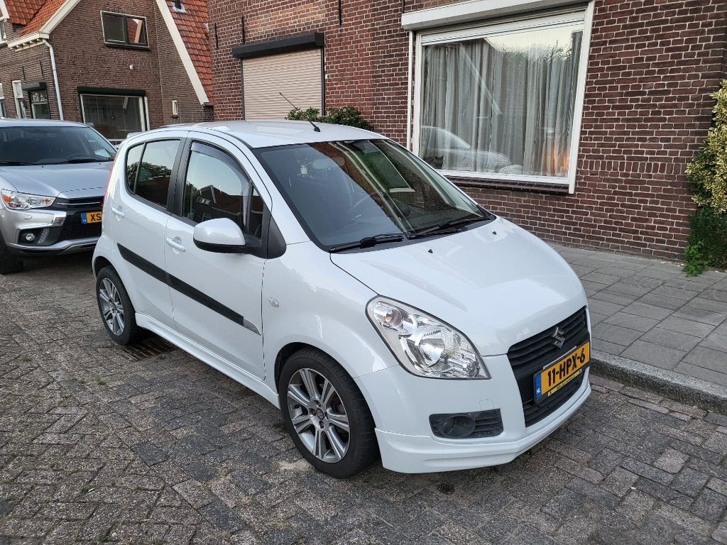 Suzuki Splash 1.2 2009 Wit, Auto's, Voorwielaandrijving, Dealer onderhouden, 40 €/maand, 4 cilinders