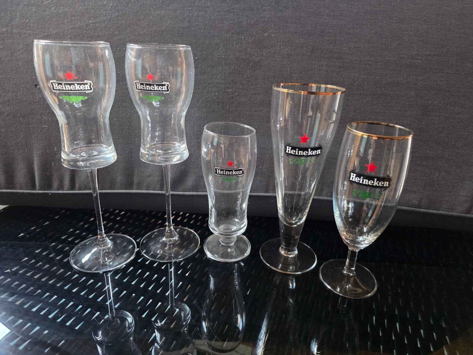 24 heineken glazen, verschillende, collectie, Verzamelen, Ophalen of Verzenden, Zo goed als nieuw, Glas of Glazen, Heineken