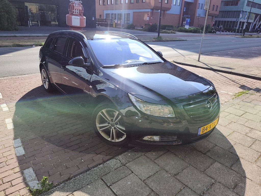 Opel Insignia 1.6 Turbo Sport Tourer 180pk 2010 Zwart, Auto's, 4 cilinders, 179 pk, Leder en Stof, Zwart