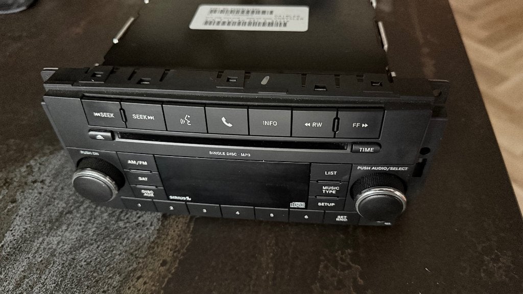 Chrysler/Dodge/Jeep Radio CD Speler P05091115AC, Auto diversen, Ophalen, Gebruikt