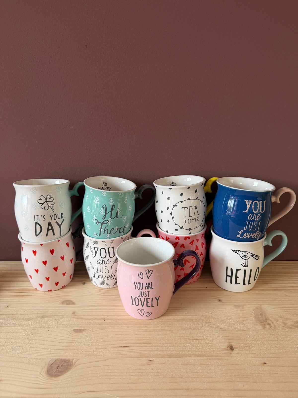 9 Hema thee/koffie mokken - diverse kleuren en teksten, Gebruikt, Ophalen of Verzenden, Steen/keramiek, Meerkleurig