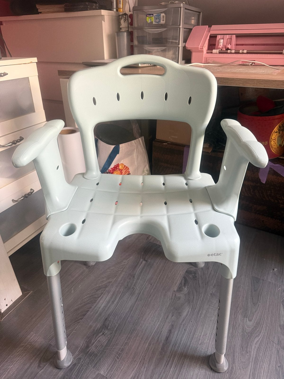Etac Douchestoel, Ophalen
