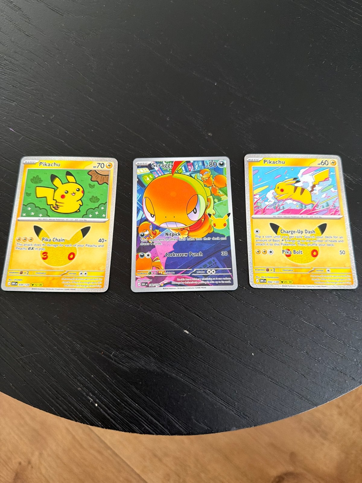 Pokémon kaarten: Pikachu en Scraggy, Ophalen of Verzenden, Zo goed als nieuw, Meerdere kaarten