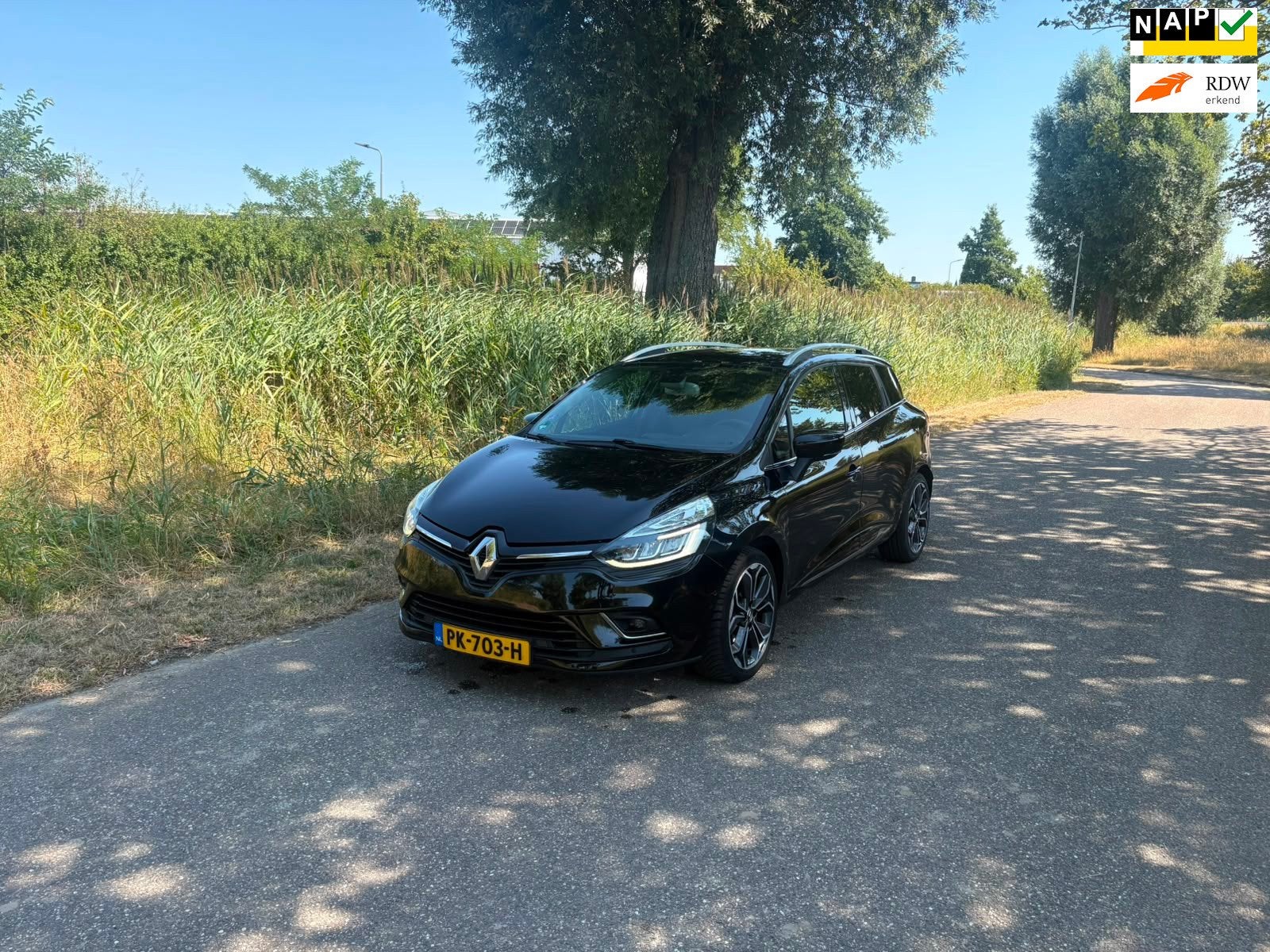 Renault Clio Estate 1.2 TCe Intens, Airco Cruise Trekhaak Na, Auto's, Gebruikt, 4 cilinders, 635 kg, Leder en Stof