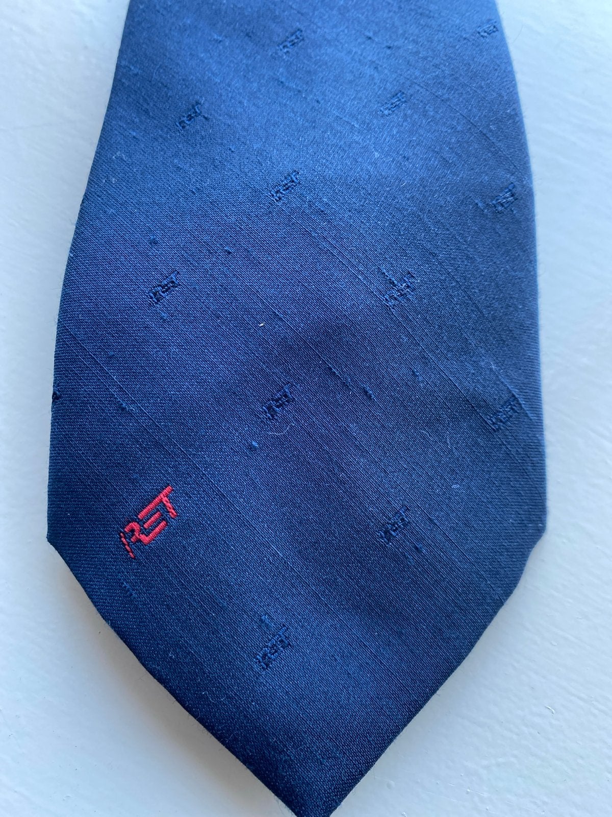 RET stropdas - Blauw met rood logo, Ophalen of Verzenden, Zo goed als nieuw, Blauw, Met patroon