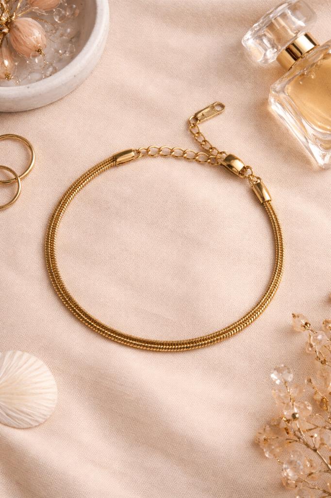 Slangen armband goudkleurig - Nieuw, Ophalen of Verzenden, Nieuw, Goud, Overige materialen