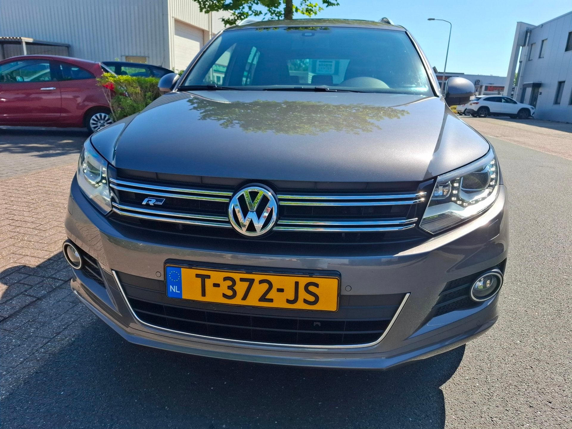 Volkswagen Tiguan 1.4 TSI R-line Edition PANO/XENON/NAVI/CAM, Auto's, Voorwielaandrijving, Euro 5, 15 km/l, Zwart