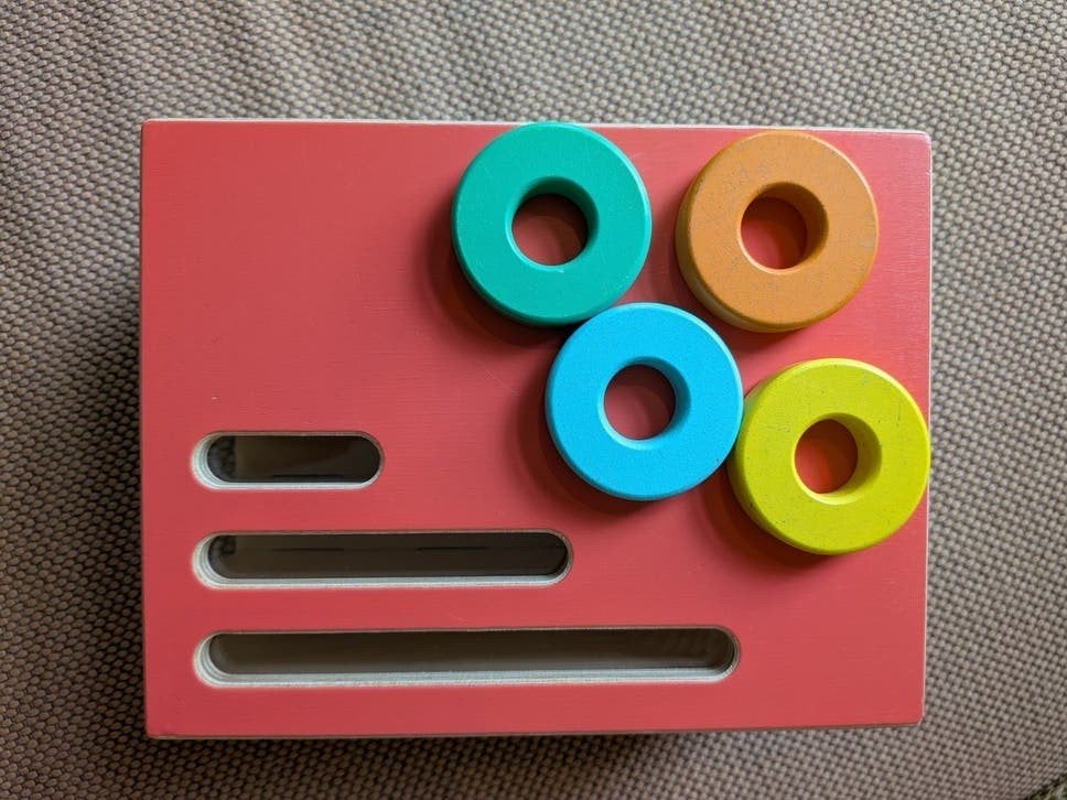 Lovevery 'Count & slide ring chute', Kinderen en Baby's, Speelgoed | Educatief en Creatief, Ophalen of Verzenden, Gebruikt, Ontdekken