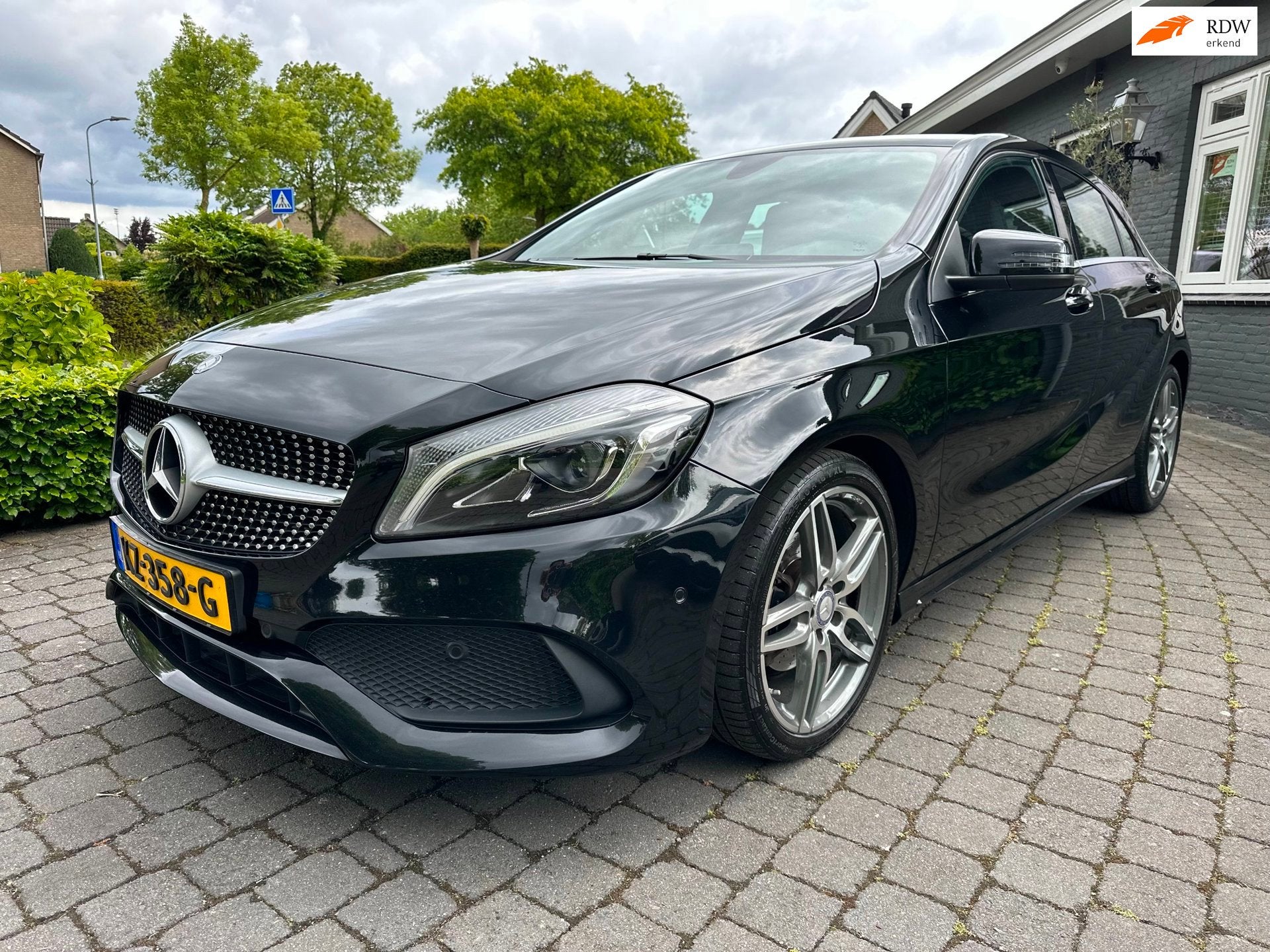 Mercedes-Benz A-klasse 160 Ambition AMG, Xenon Org NL, Auto's, Gebruikt, 4 cilinders, Zwart, Bedrijf