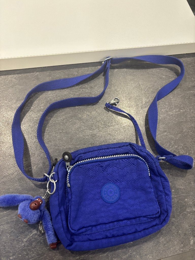 Kipling blauwe schoudertas met aapje, Sieraden, Tassen en Uiterlijk, Ophalen of Verzenden, Gebruikt, Blauw, Kipling