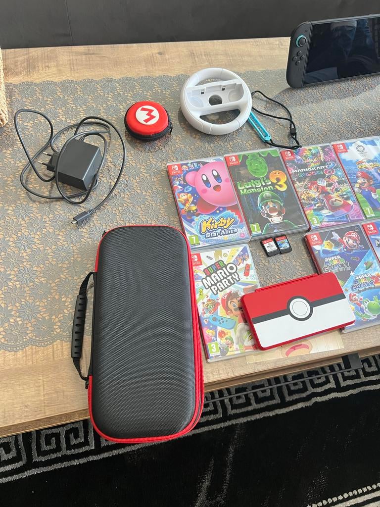Nintendo Switch met 10 spellen en accessoires, Overige genres, Eén computer, Ophalen of Verzenden, Zo goed als nieuw