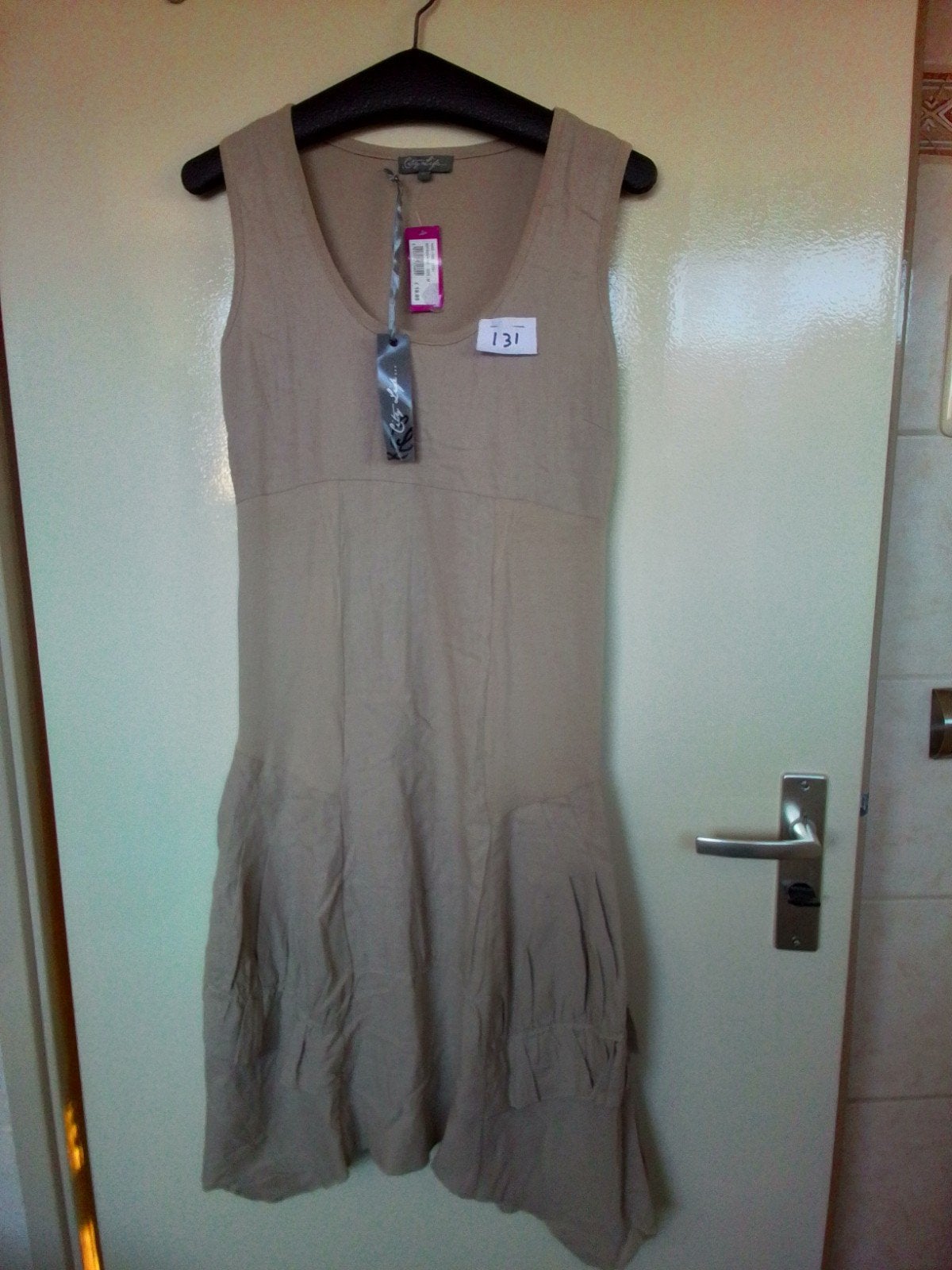 131 Beige jurk van City Life maat M nieuw, Maat 38/40 (M), Beige, Nieuw, Ophalen of Verzenden