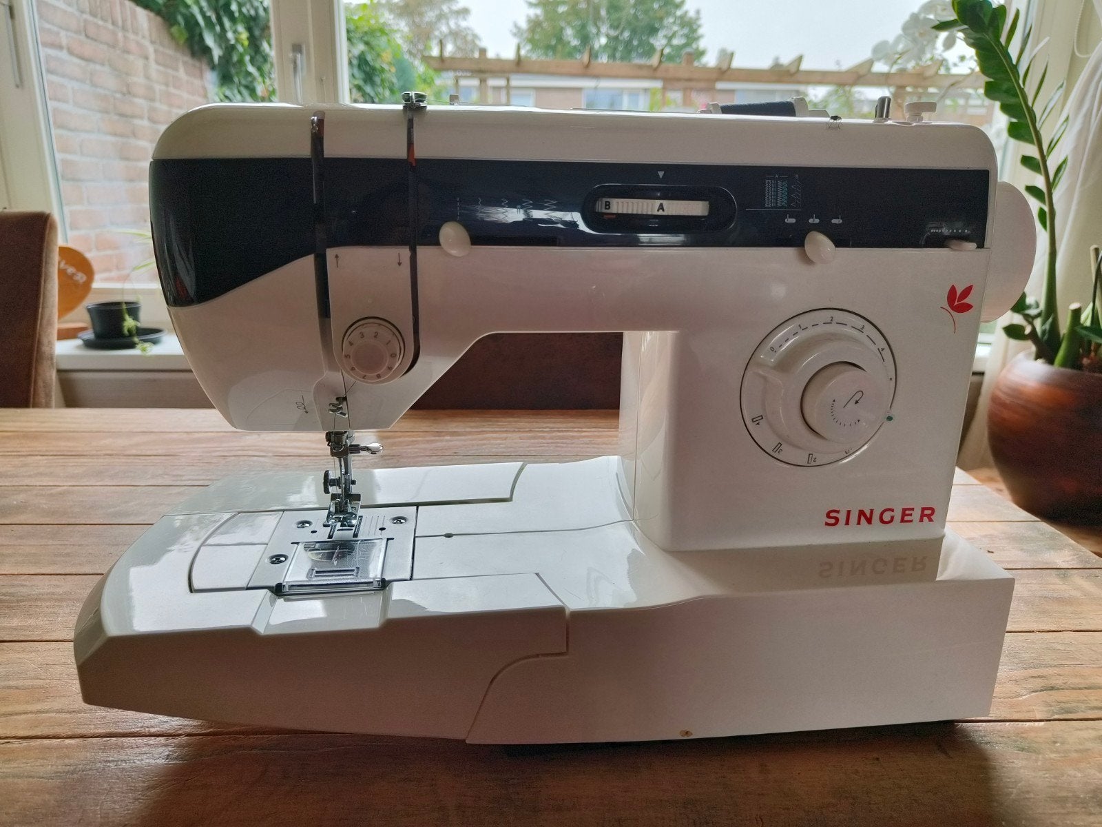 Singer naaimachine, Ophalen