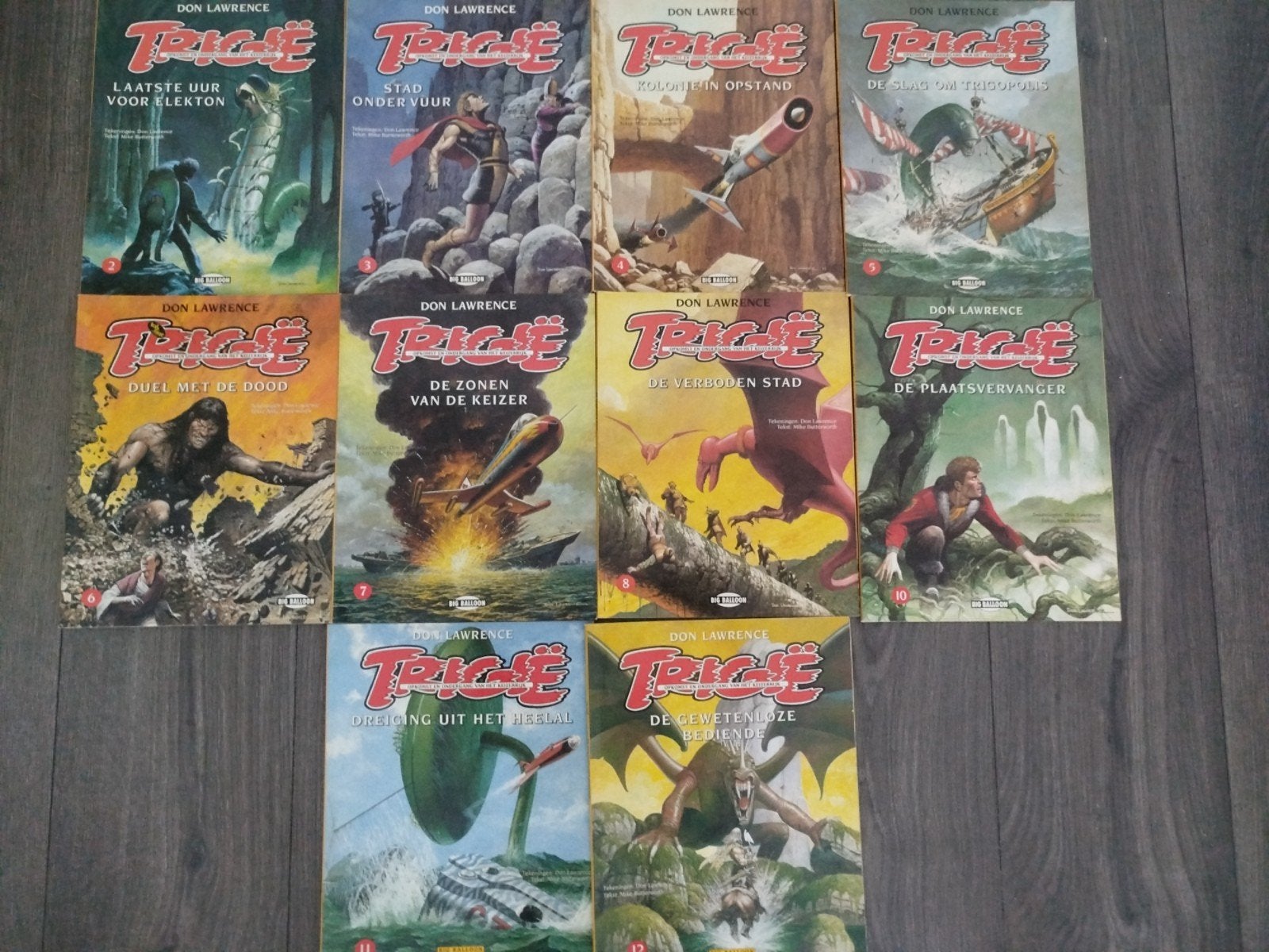 TRIGIE STRIPBOEKEN COLLECTIE, Gelezen, Ophalen of Verzenden, Don Lawrence, Meerdere stripboeken