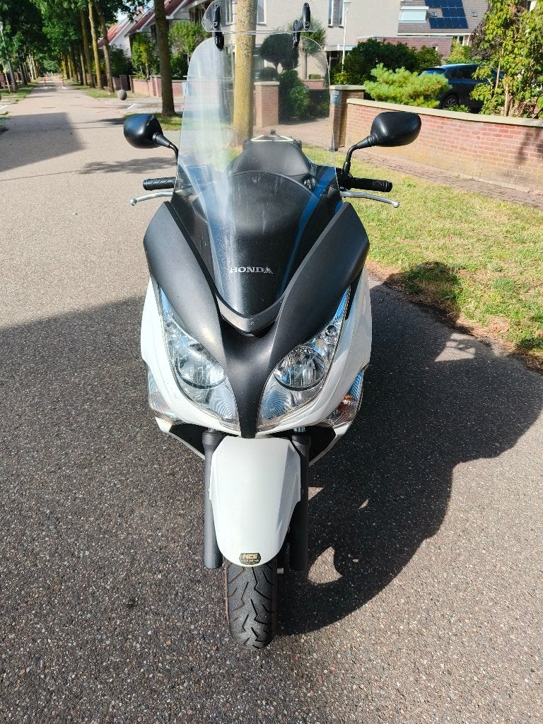 Honda scooter 400 sw 28.7 Kw uit 2009 28933 kilometer, Gebruikt, Particulier, 399 cc, Minimaal motorrijbewijs A2