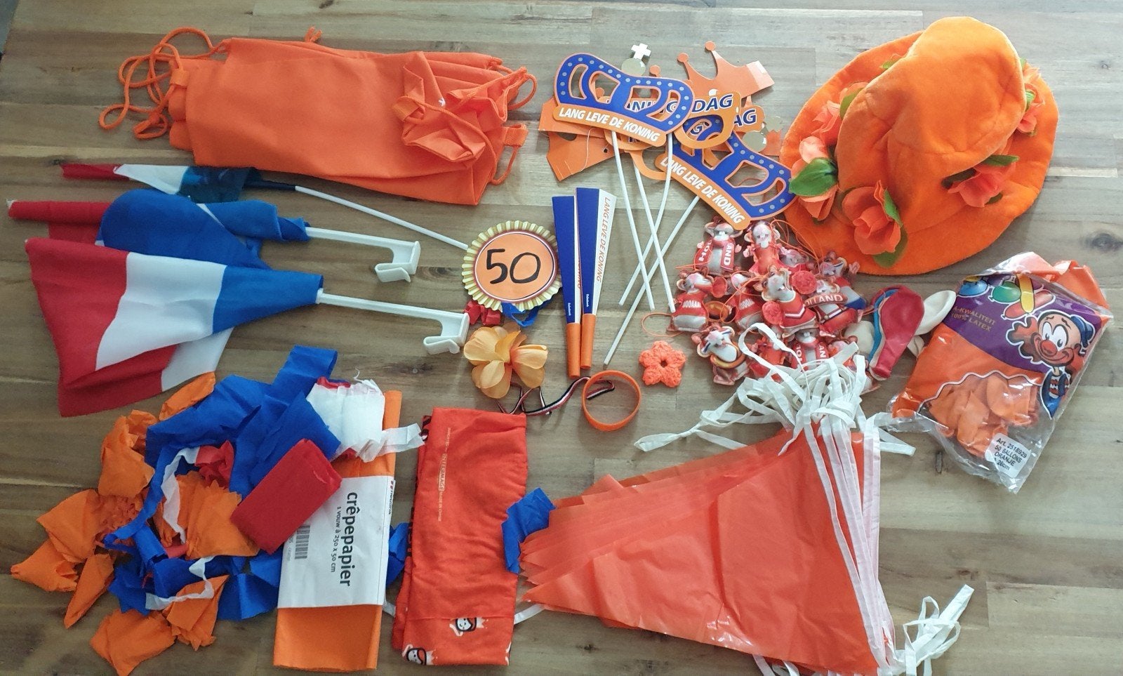 tasje met oranje spullen, Ophalen
