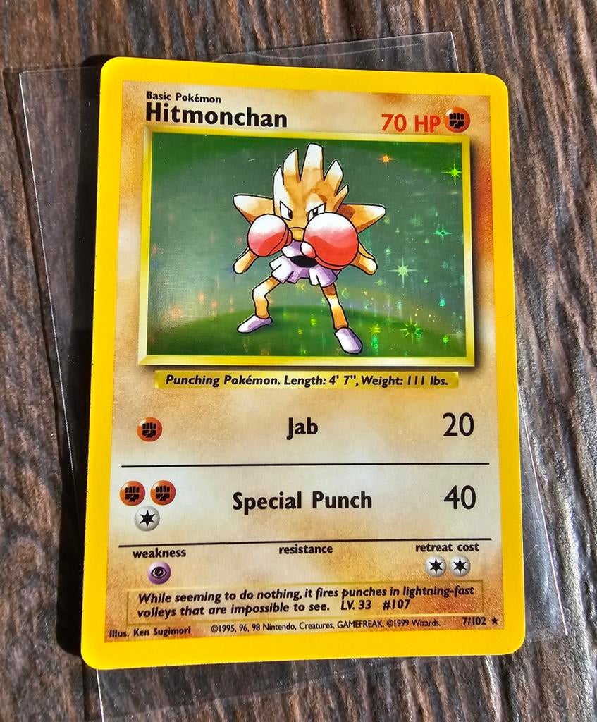 Superstrakke Hitmonchan uit de Base Set 7/102  🥊, Ophalen of Verzenden, Nieuw, Losse kaart, Foil