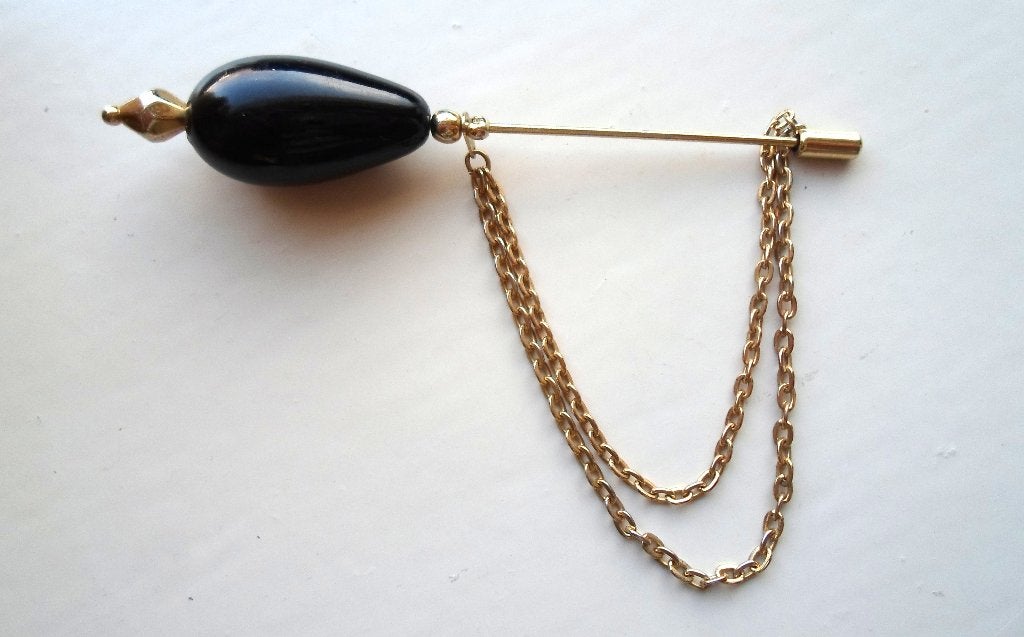 Oude broche. Goudkleurig met zwarte steen en kettinkje, Ophalen of Verzenden, Zo goed als nieuw, Overige kleuren, Overige materialen