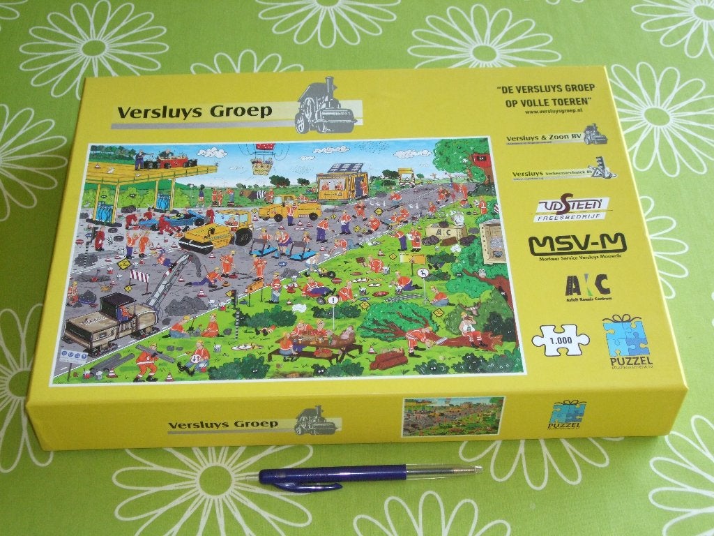 Cartoon puzzel Versluys Groep - 1000 stukjes, Ophalen of Verzenden, 500 t/m 1500 stukjes, Gebruikt, Legpuzzel