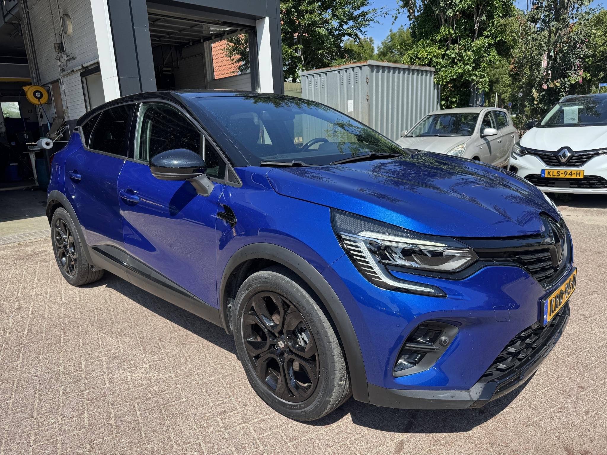 Renault Captur 1.6 E-Tech Hybrid 145pk Rive Gauche, Auto's, Renault, Gebruikt, 715 kg, Blauw, Leder en Stof