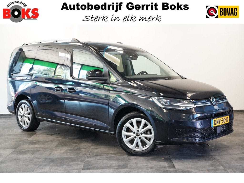 Volkswagen Caddy Maxi 1.5 TSI 7p 7 Persoons PDC Navigatie 24, Auto's, 1556 kg, Stof, 4 cilinders, Zwart