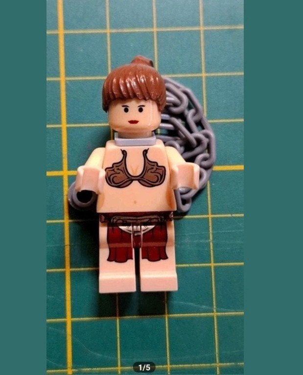 Lego Star Wars SW0085 Princess Leia Jabba Slave Outfit, Ophalen of Verzenden, Actiefiguurtje