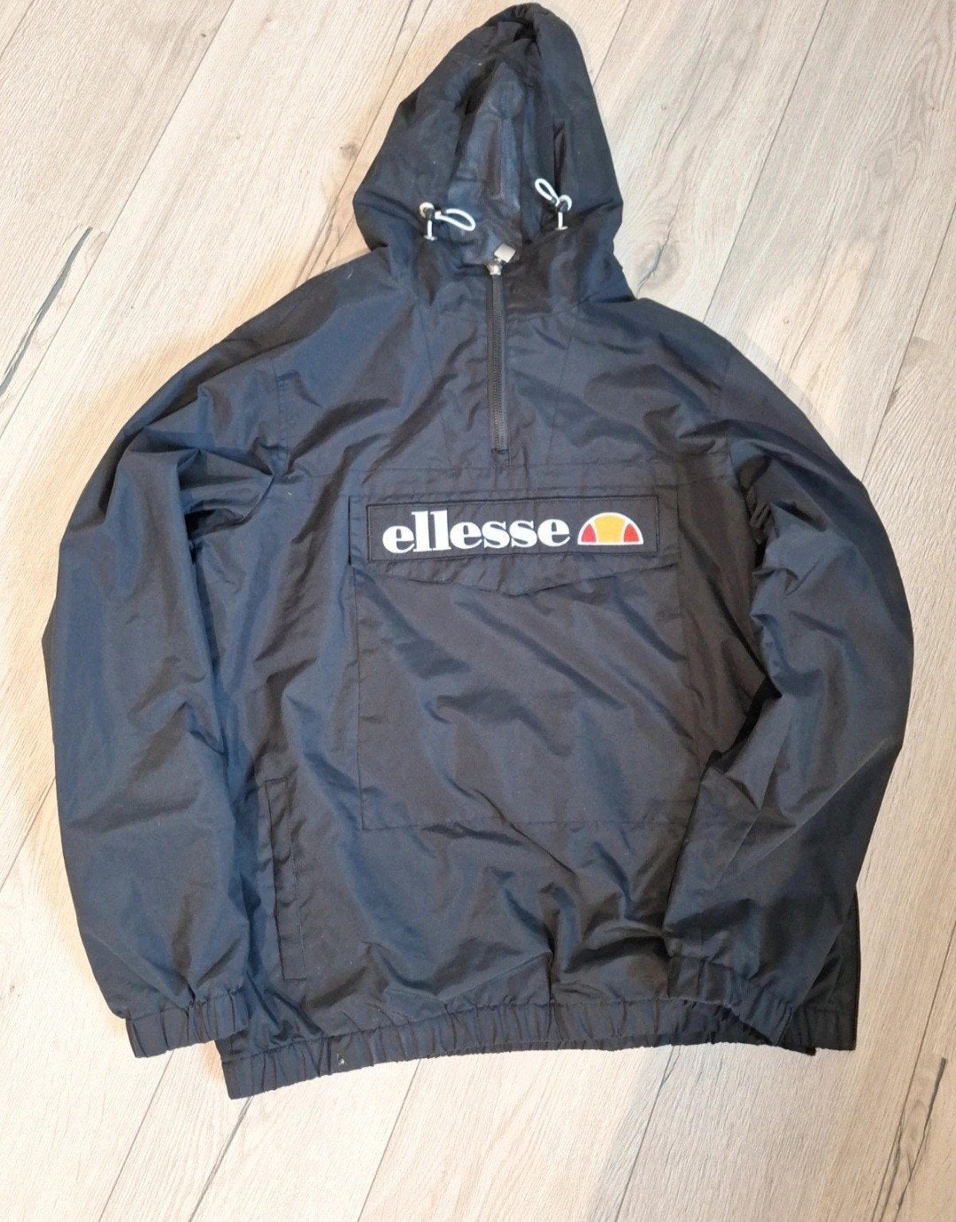 Ellesse jas, Maat L - Zo goed als nieuw, Maat 52/54 (L), Verzenden, Zwart, Ellesse
