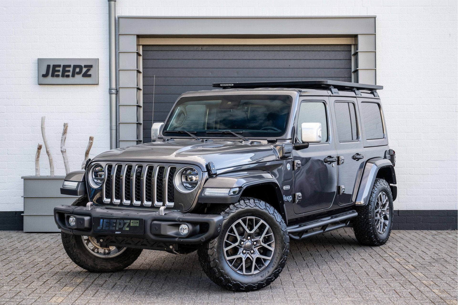 Jeep Wrangler Unlimited 4xe 380 Overland -Ofd voorbumper - R, Auto's, Jeep, Automaat, Dealer onderhouden, Zwart, 4 cilinders