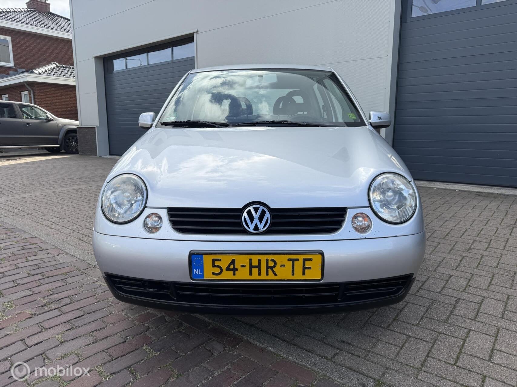 Volkswagen Lupo 1.4-16V Trendline AUTOMAAT, Auto's, Dealer onderhouden, 31 €/maand, 4 cilinders, 4 stoelen