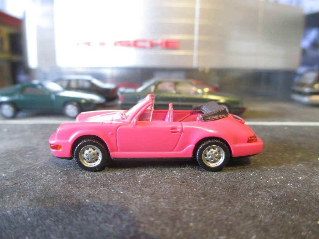 Porsche 964 911 Carrera 4 Cabrio met versteIbare spoiler #1, Ophalen of Verzenden, Gebruikt, Auto, Rietze