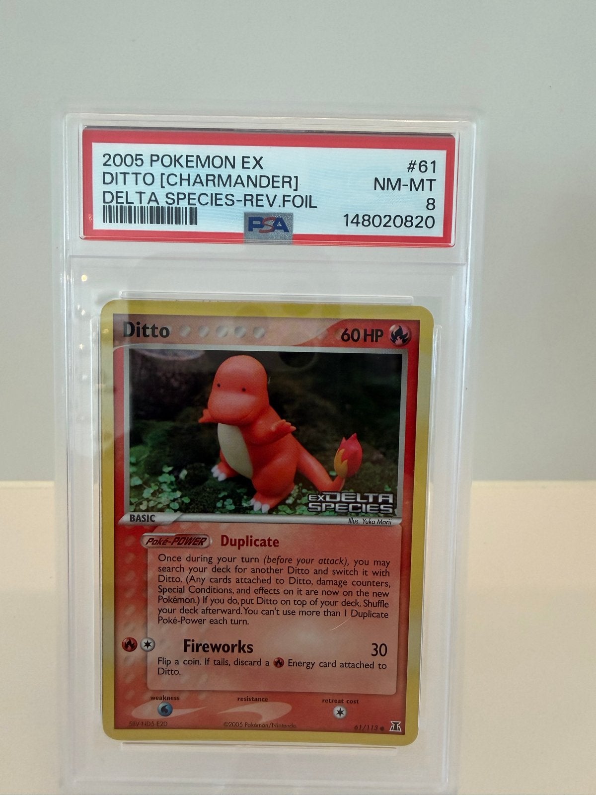 PSA 8 2005 Pokemon EX Delta Species Ditto Charmander, Ophalen of Verzenden, Zo goed als nieuw, Losse kaart, Foil
