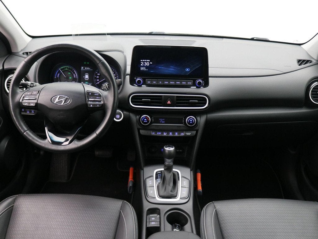 Hyundai Kona 1.6 GDI HEV Premium / Trekhaak / Lederen bekled, Auto's, Hyundai, Gebruikt, Euro 6, 2 kWh, Wit