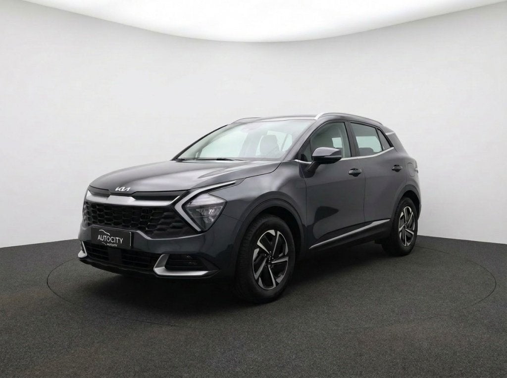 Kia Sportage 1.6 T-GDi Hybrid 230PK DynamicLine | Carplay |, Auto's, Stof, Gebruikt, 4 cilinders, Zwart