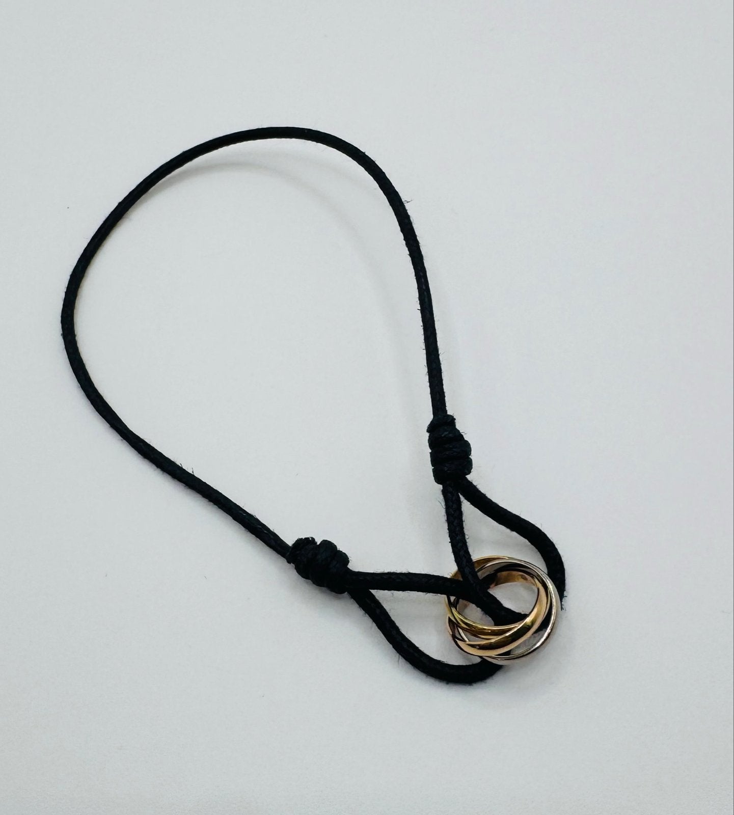 Cartier Trinity Cord Armband 750 Goud, Ophalen of Verzenden, Zo goed als nieuw, Overige kleuren, Goud
