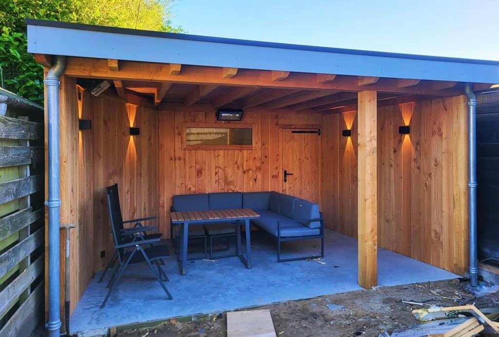 Foto 8 van Luxe Tuinkamer met Overkapping en Glazen Schuifwanden