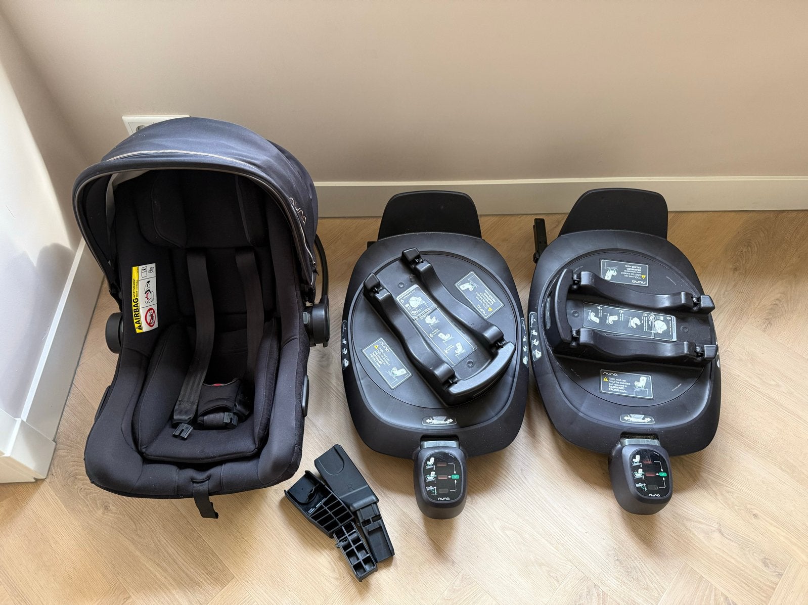 Nuna autostoel met twee Isofix bases en adapters, Gebruikt, Isofix, 0 t/m 13 kg, Ophalen