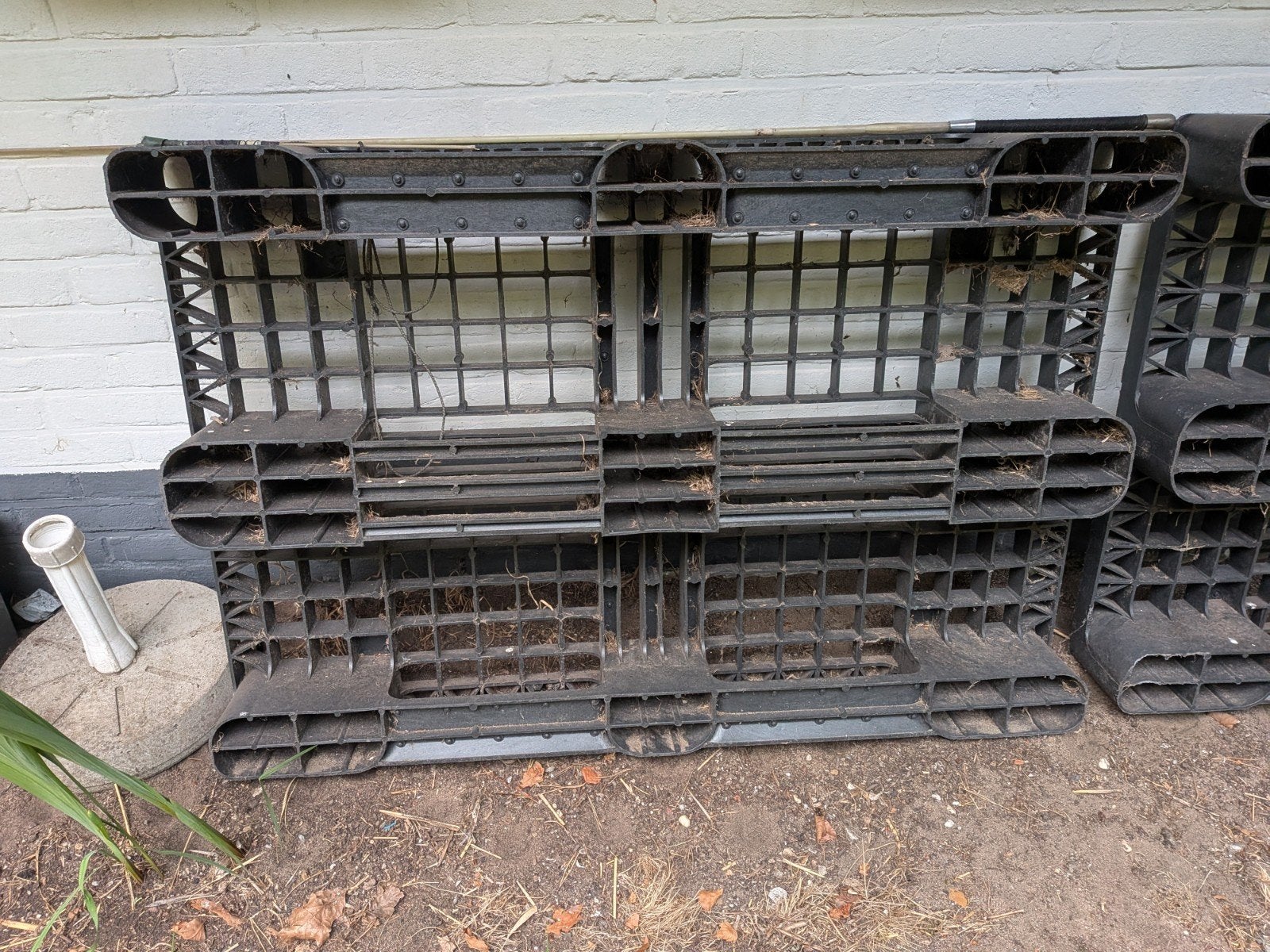 Zwarte stevige kunststof pallets te koop, Ophalen