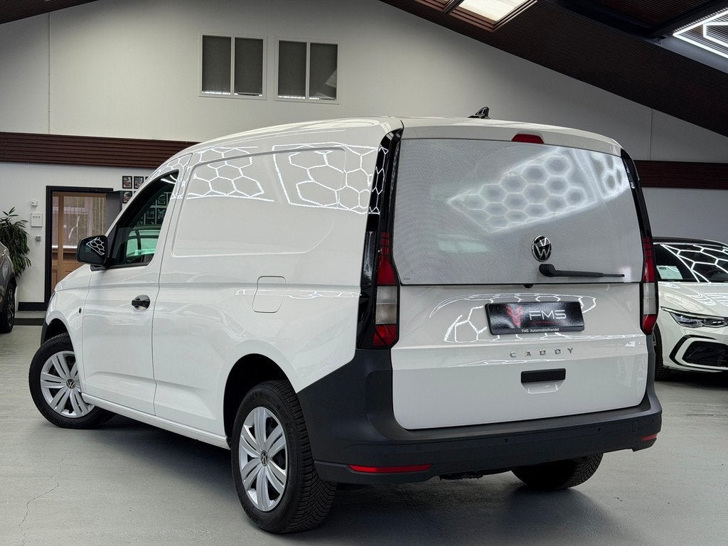 Volkswagen Caddy Cargo 1.5 TSI Camera CarPlay, Auto's, Bestelauto's, Voorwielaandrijving, Stof, Zwart, 4 cilinders